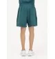 New Balance Pantaloncini Sport Essentials French Terry Unisex Medusa Green Verde | New Balance | 