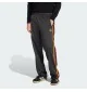 Adidas Pantaloni Firebird M Nero Rosso Giallo | Adidas | 